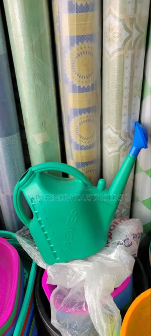 Green Flower Bed Watering Can