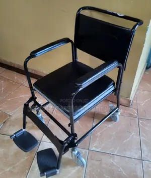 New Commode Chair With Lockable Castors and Footrest (With Backrest)