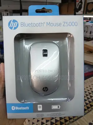This Is an Hp Bluetooth Mouse Z5000 Featuring a Sleek Silver Design.
