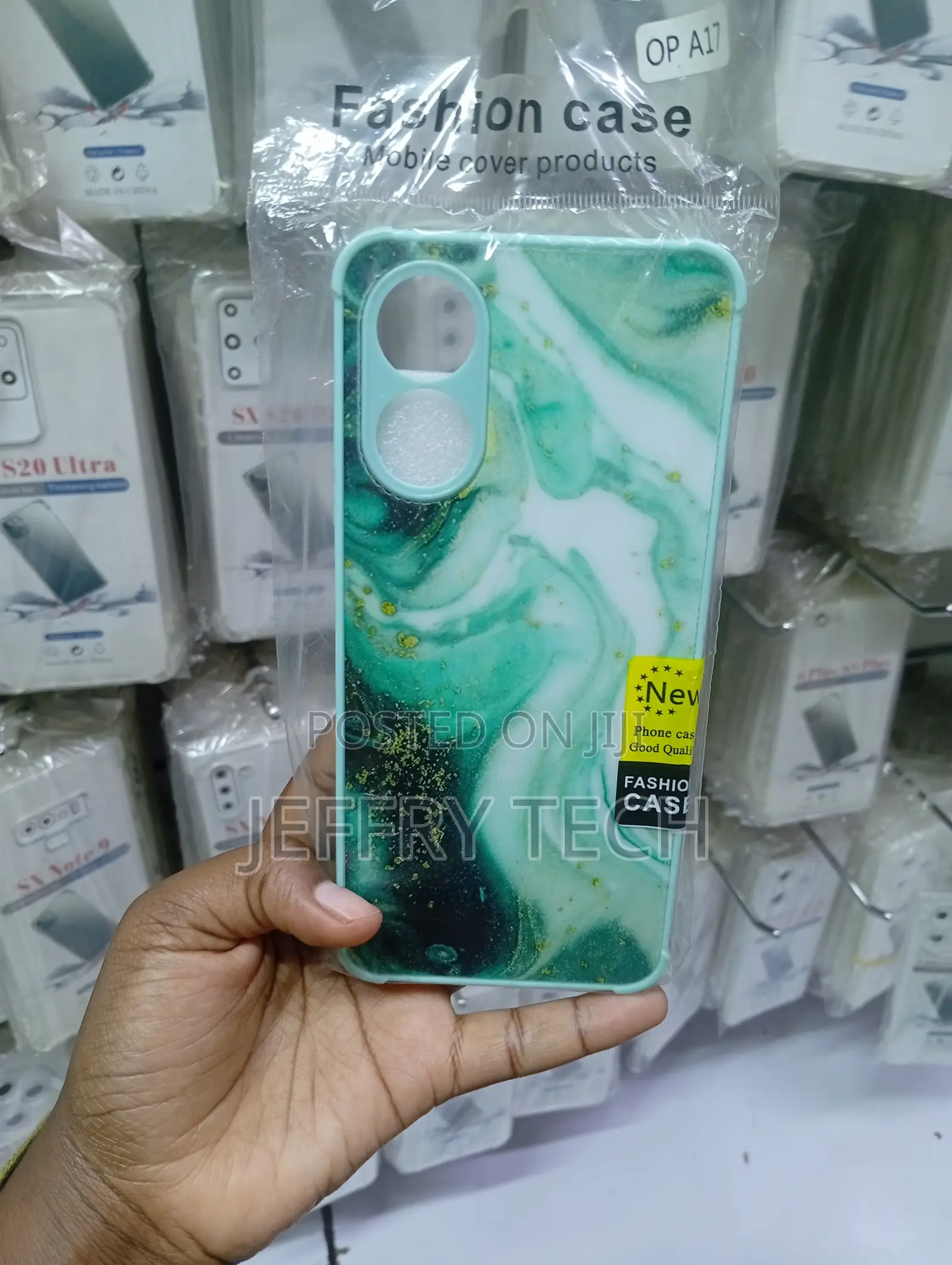 Case Cover Features a Green and White Marble Pattern With Gold