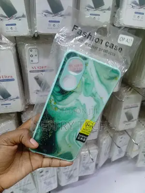 Case Cover Features a Green and White Marble Pattern With Gold