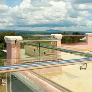 Curved Frameless Glass Balustrade With Stainless Steel Handrail