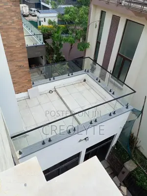 Frameless Glass Rooftop Terrace Balustrade With Black Spigots