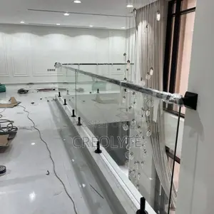 Frameless Glass Landing Balustrade With Black Spigots