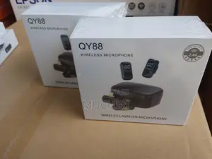 Qy88 Wireless Microphone System With a Portable Charging Case