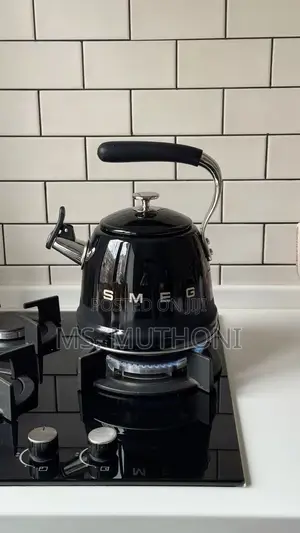 Black Smeg 50's Style Whistling Kettle Features a 2.3-Liter Capacity