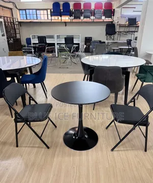 2 Seater Folding Chairs With a Black Round Marble Table