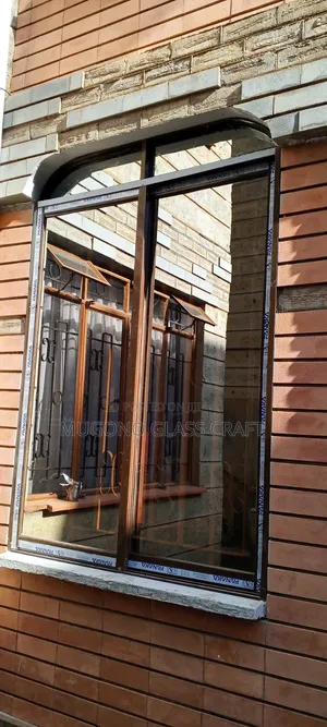 Brown Coated Sliding Windows in Kenya