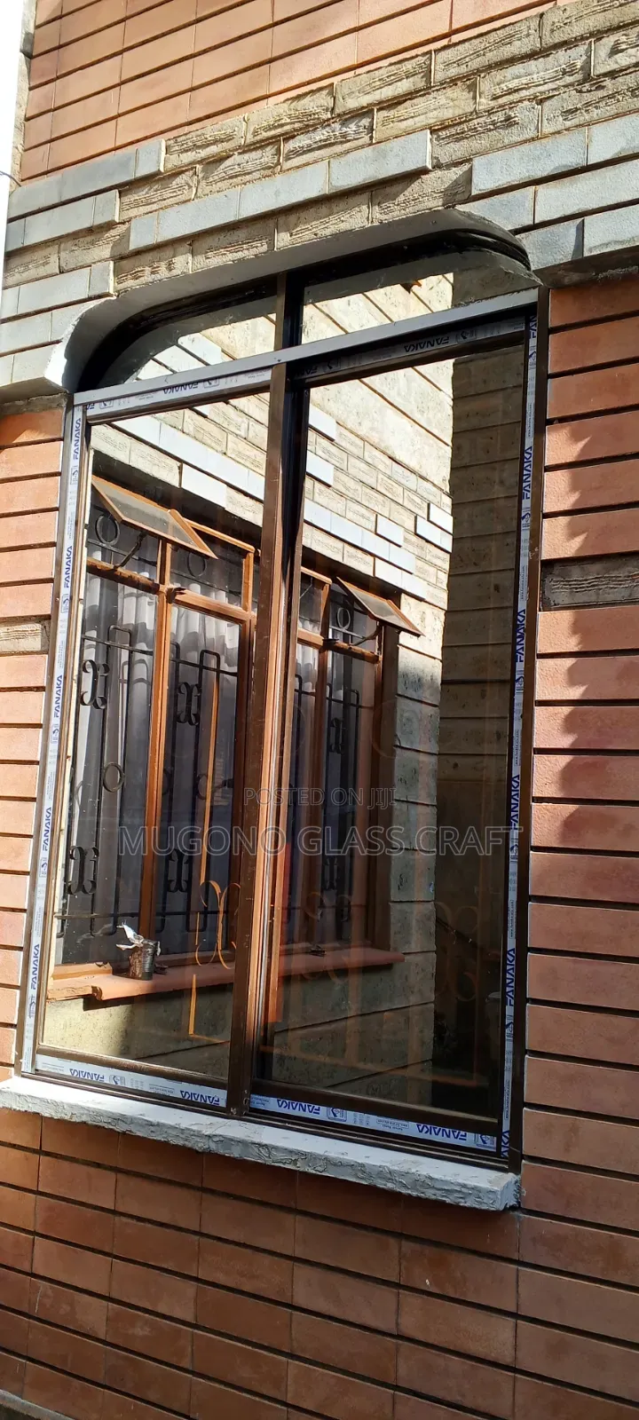 Brown Coated Sliding Windows in Kenya