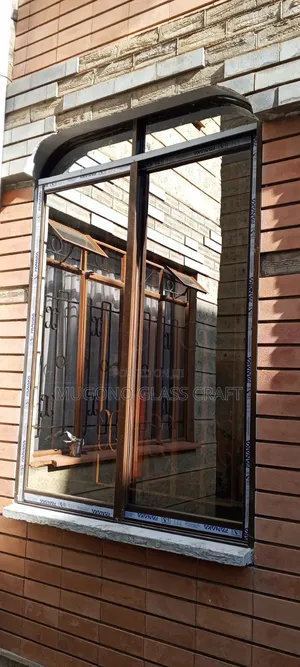 Brown Coated Sliding Windows in Kenya