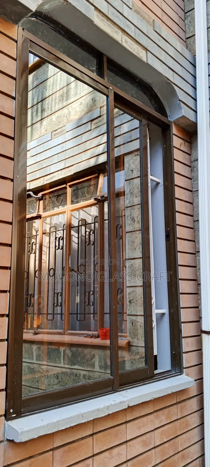 Brown Coated Sliding Windows in Kenya