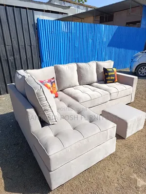 Light Grey L-Shape Sofa + Ottoman