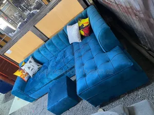 Blue L-Shaped Sectional Sofa + Ottoman