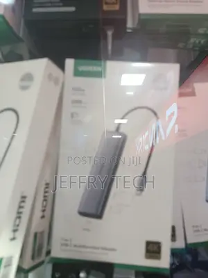 Ugreen 10-in-1 Usb-C Hub Features a Dark Gray Aluminum Finish and Su