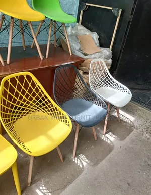 Meshed Plastic Eams Outdoor Chairs
