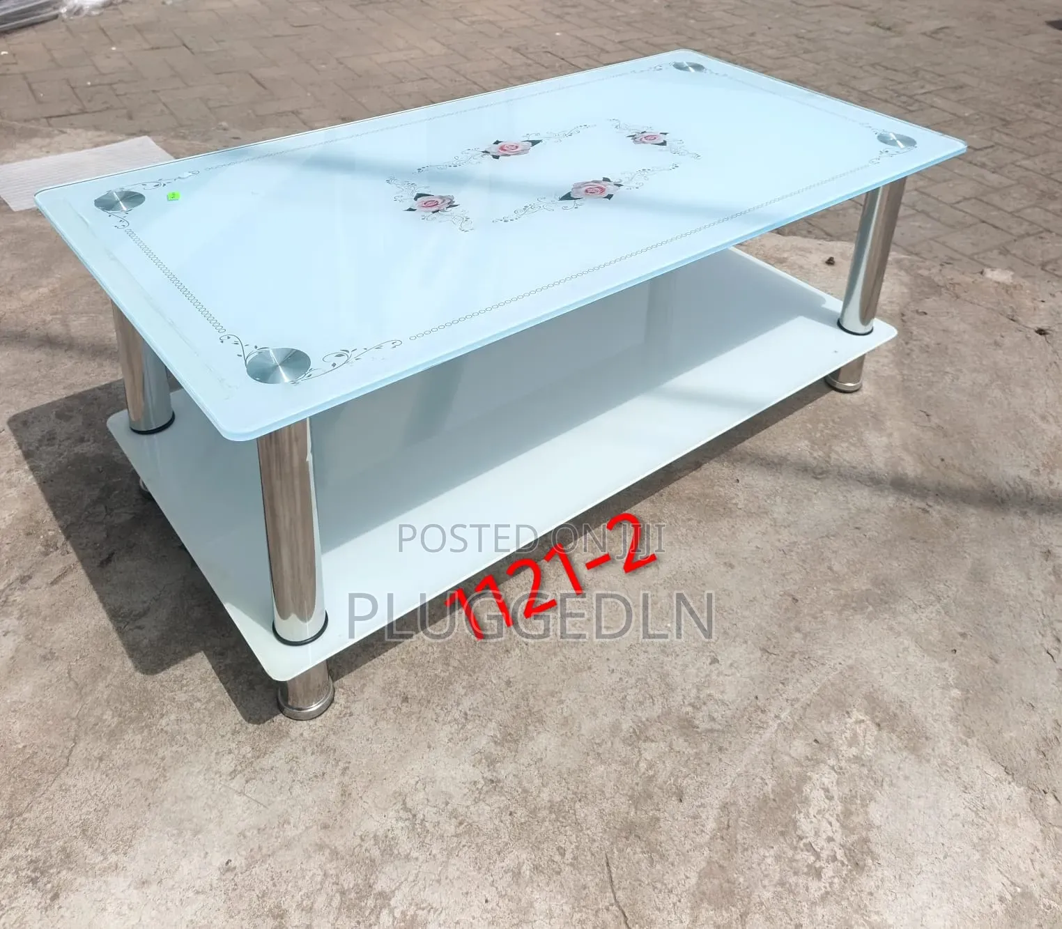Modern Glass Coffee Table .