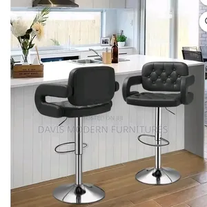 Two Black Tufted Adjustable Bar Stools