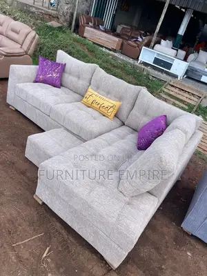 6-Seater L-Shaped Sofa – Nude Tufted Design With Cushions
