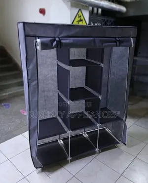 Spacious 3 Column Metallic Clothes Wardrobe With Shelves