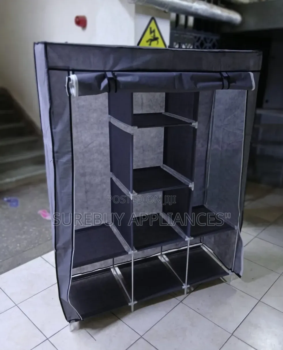 Spacious 3 Column Metallic Clothes Wardrobe With Shelves