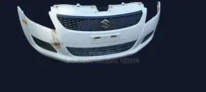 White Front Bumper for a 2011–2013 Suzuki Swift.