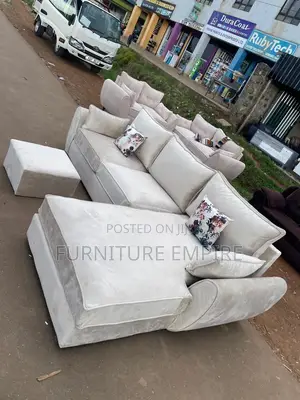 6 Seater Beige L-Shaped Sofa With Foot Rest