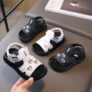 Kids' Unisex Sandals Black and White. Delivery Services Available.