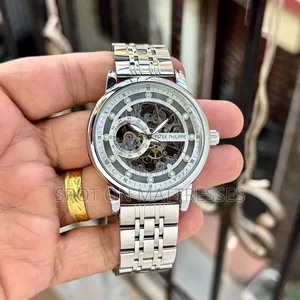 Patek Phlippe Skeleton Automatic Watch. Gold, Silver and Black.
