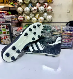 Black and White Copa Mundial Firm Ground Boots