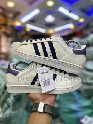 Adidas Superstar “ White Navy “
Sneakers