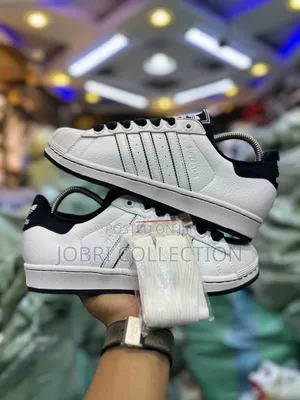 Adidas Superstar “ Cloud White Core Black “
Sneakers