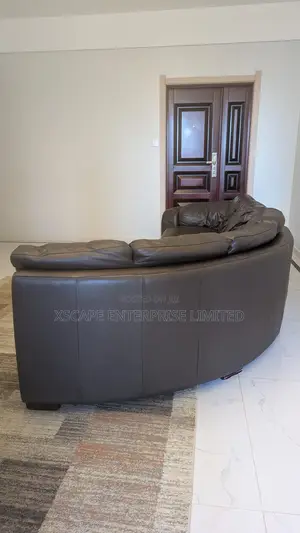 Large Curved Leather Corner Sofa