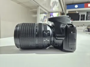 Nikon D3500 With 18-140mm Charger Strap and Battery Included.