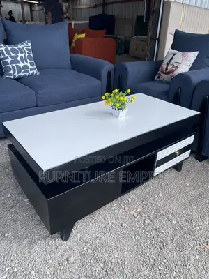 Modern Rectangular Coffee Table With Glossy White Top and Black Base