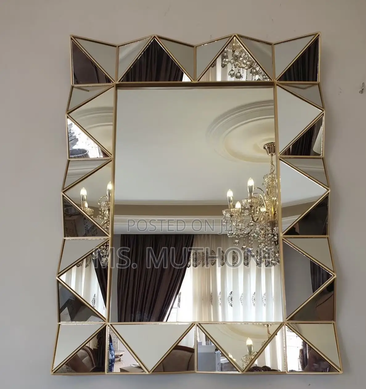 Fancy Triangular Glass Panels With a Gold Finish Wall Mirror