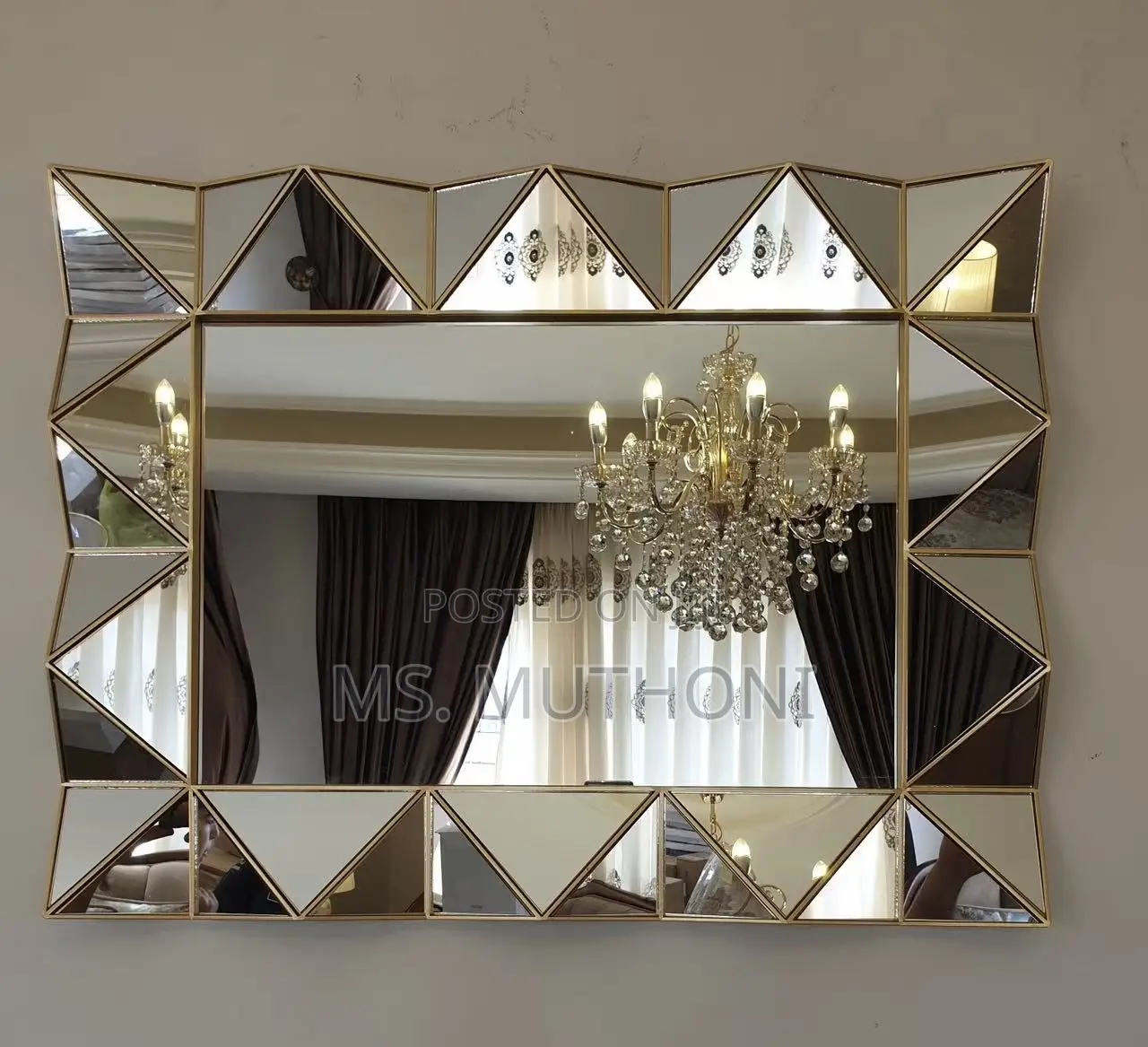 Fancy Triangular Glass Panels With a Gold Finish Wall Mirror