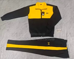 Under Armour Model 1175 Tracksuit Featuring Black and Yellow