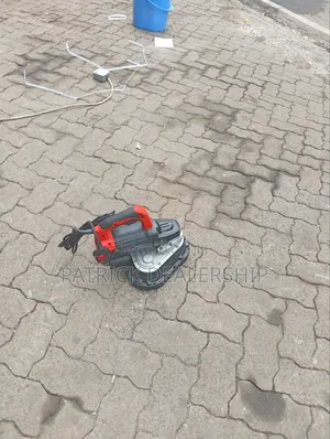 Hand-Held Floor Grinder