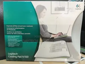 Logitech Cooling Pad N100 Slotted With White Surface and a Green Base.