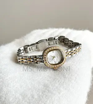 Textured Dial and a Diamond-Studded Bezel. Scottie Ladies Watch