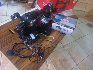 Singer Sewing Machine With Electric Motor