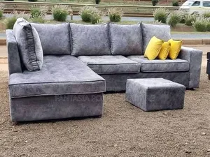 Grey L-Shaped Sofa + Ottoman (5-Seater)