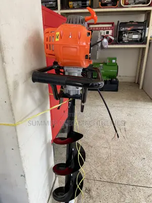 Portable, Orange and Black Gasoline-Powered Earth Auger
