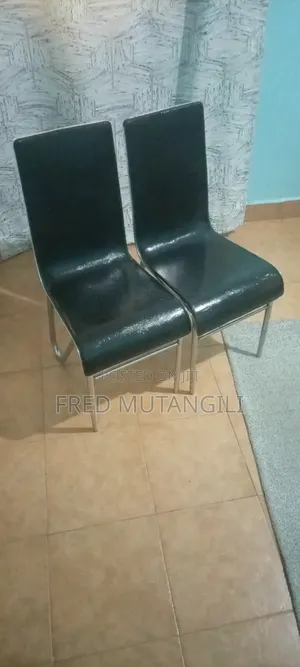 I'm Selling Two Black Chairs. Anyone Willing to Buy Call Me.