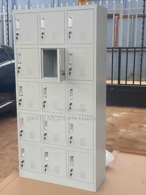 A Tall Grey Metal Filling Cabinet
