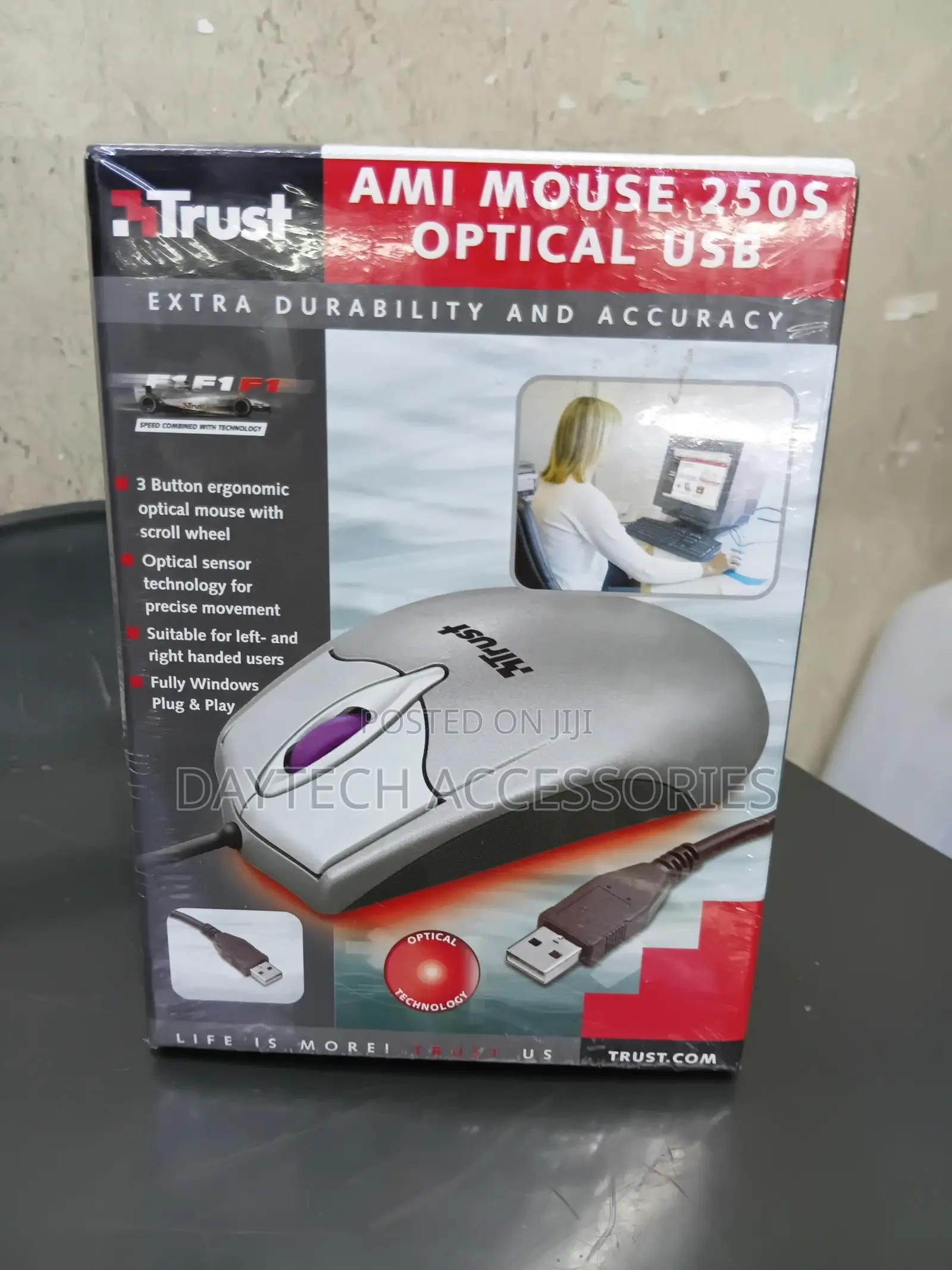 This Is a Trust Ami Mouse 250s 3-Button Ergonomic Optical Mouse.