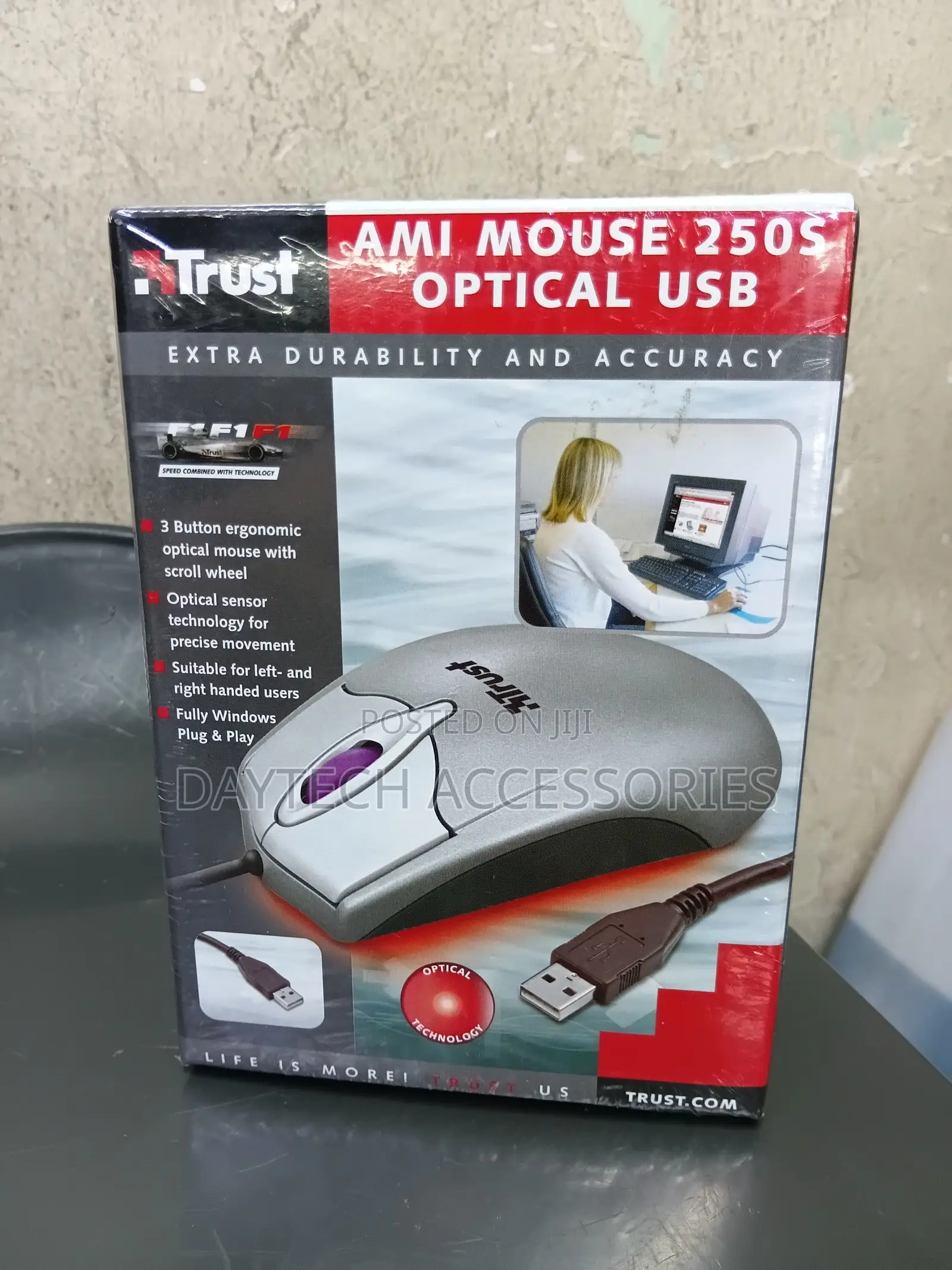 This Is a Trust Ami Mouse 250s 3-Button Ergonomic Optical Mouse.