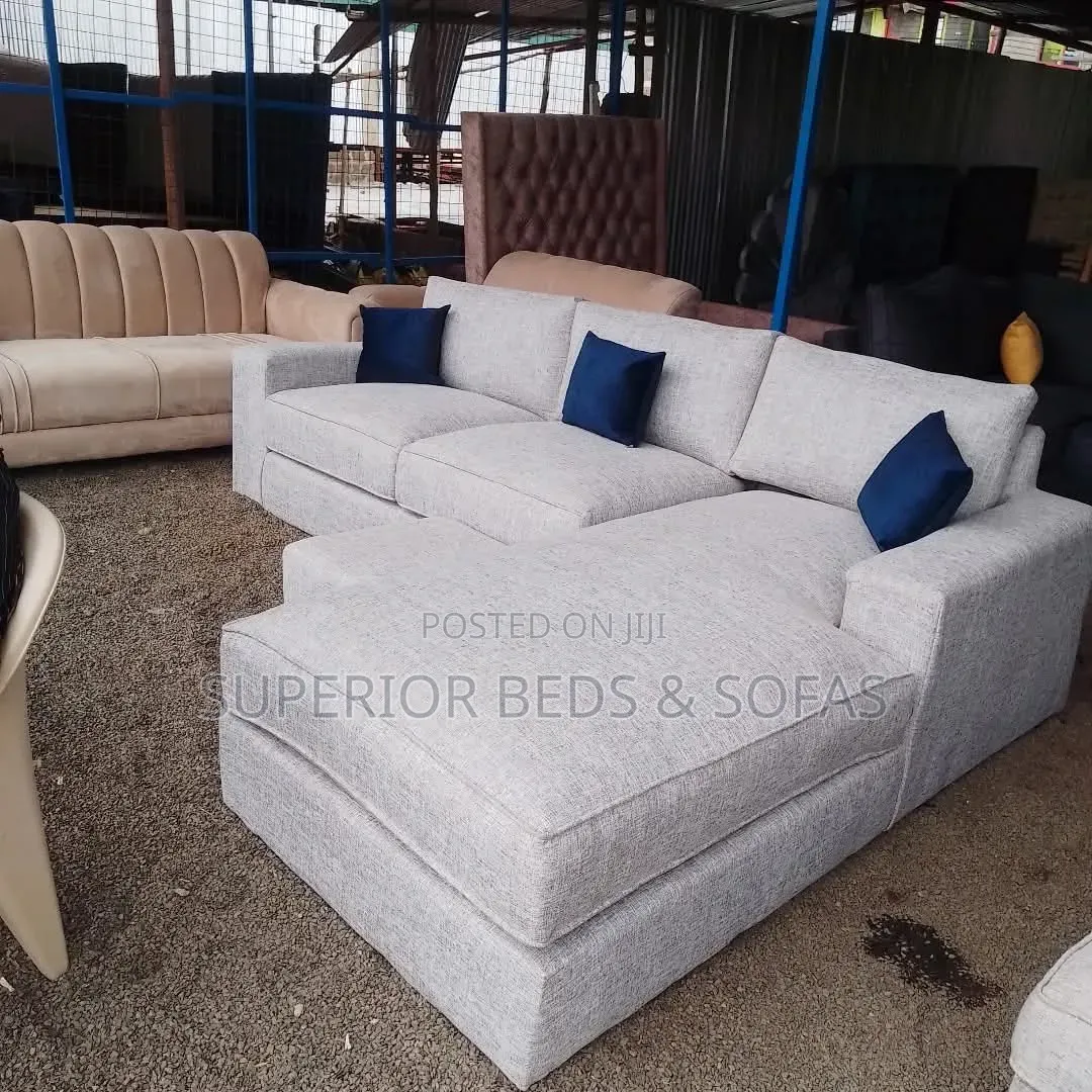 Light Grey L-Shaped Sofa 5seater With an Ottoman