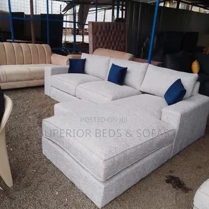Light Grey L-Shaped Sofa 5seater With an Ottoman
