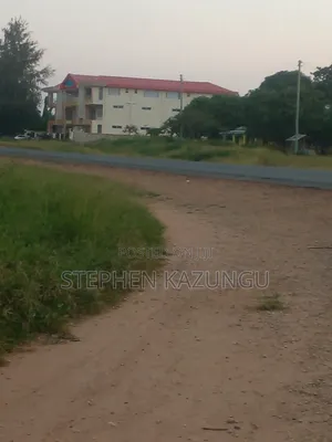 Slightly Big Than 1/2 Acre at Kinondo/Ganja La Simba on the Highway.